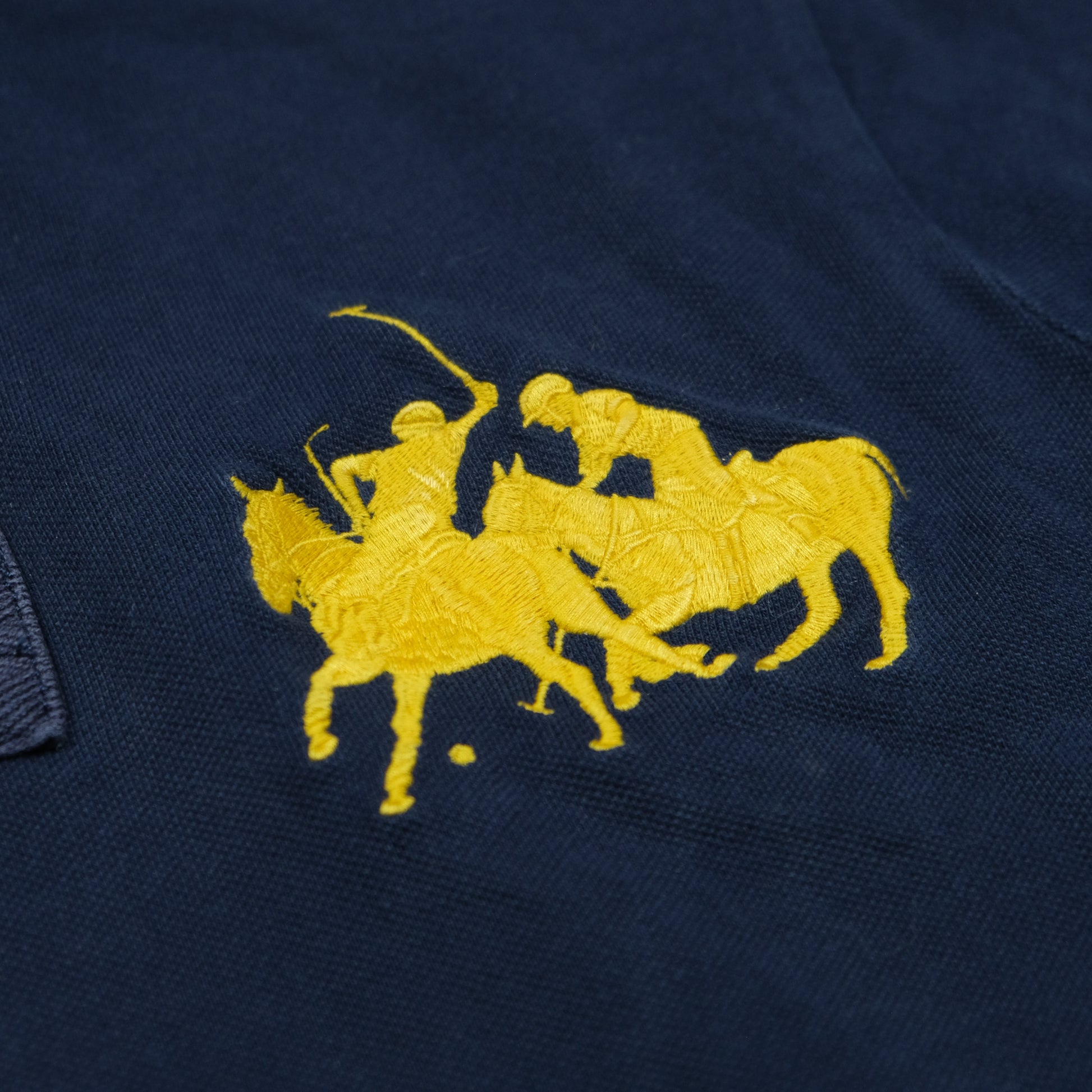 Ralph Lauren Polo (L)